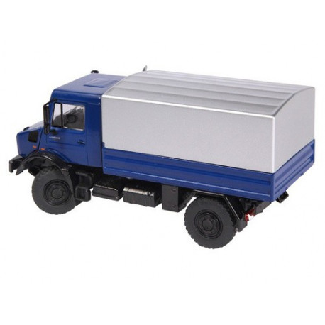 MB Unimog U 5000 bleu avec plateau bâché