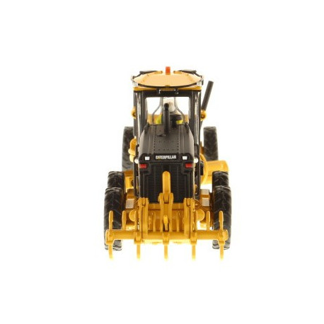 Niveleuse Caterpillar 140M avec figurine