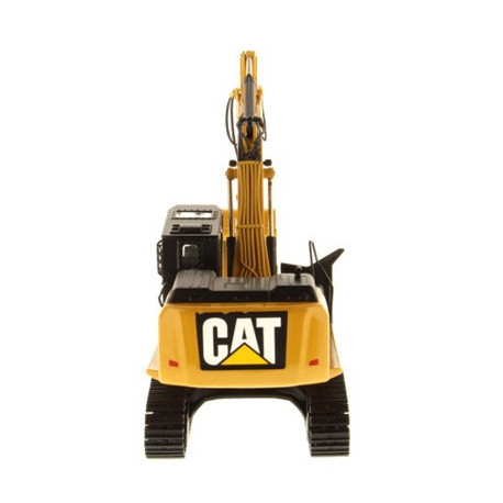 Pelle forestière Caterpillar 568 avec figurine