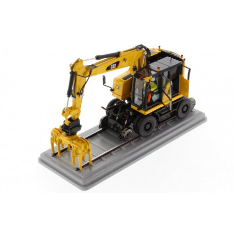 Pelle Caterpillar M323F rail jaune sécurité- Diecast Masters