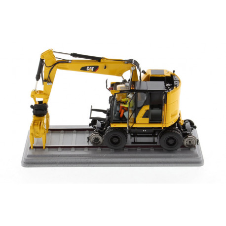 Pelle Caterpillar M323F rail jaune sécurité- Diecast Masters