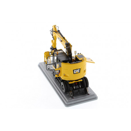 Pelle Caterpillar M323F rail jaune sécurité- Diecast Masters