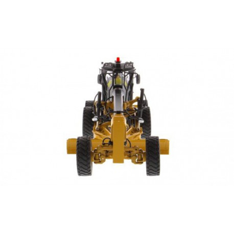 Niveleuse Caterpillar 14M3 avec figurine