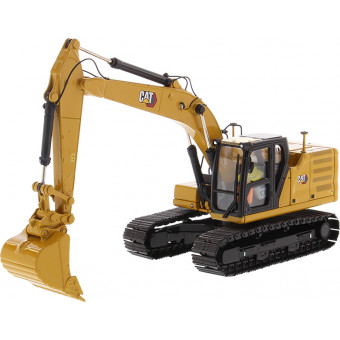 Pelle hydraulique Caterpillar 323 avec figurine