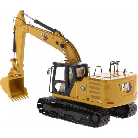 Pelle hydraulique Caterpillar 323 avec figurine