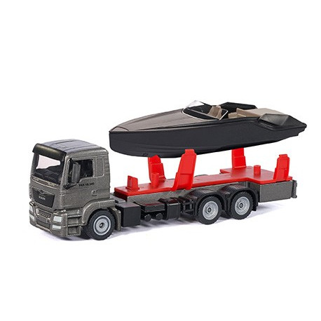 Camion Man avec bateau à moteur